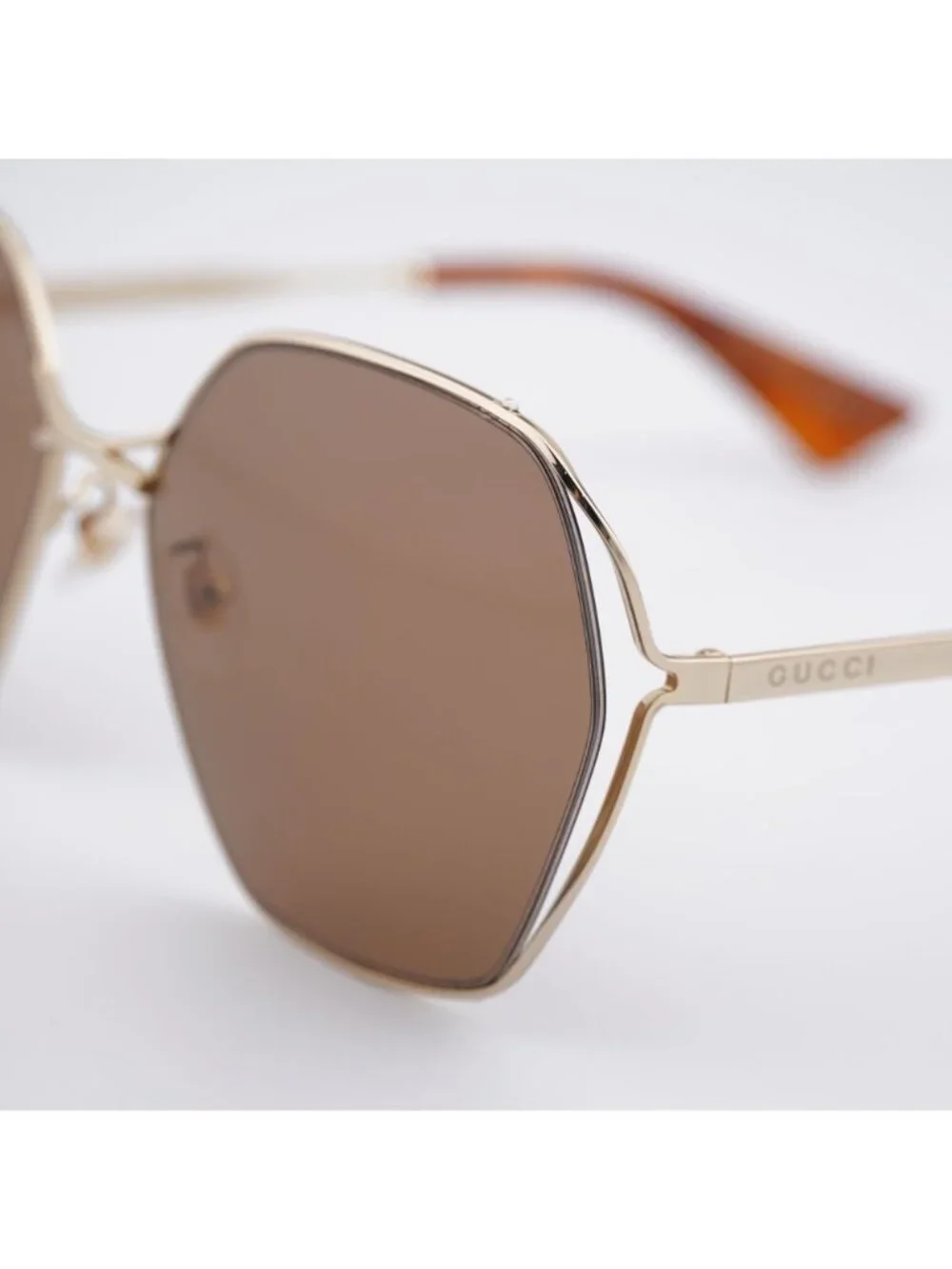 Gucci GG0818SA 002 Sunglasses Gold Geometric Frame, Brown Lenses